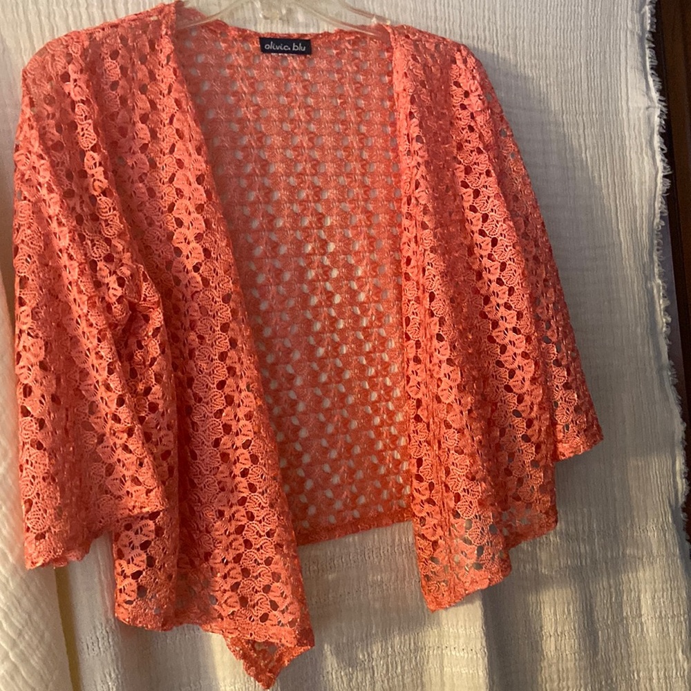 Olivia blu cover-up in orange featuring a delicate crochet in S